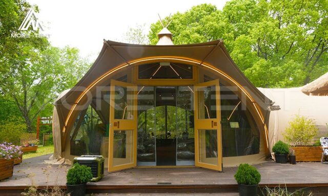 Canvas Safari Tent blending natural design elements with modern glamping features