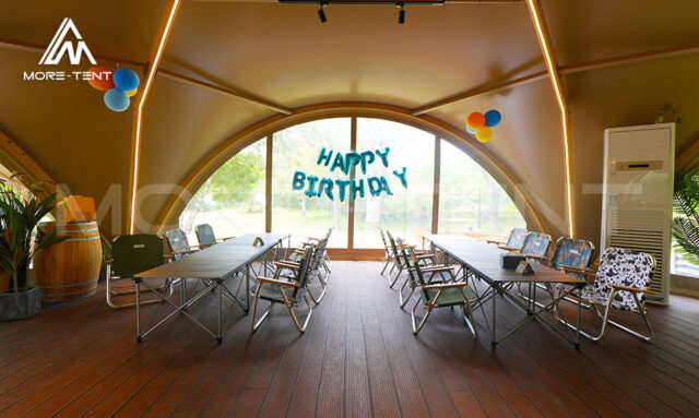 Canvas Safari Tent with UV resistant and weatherproof structure in grassland