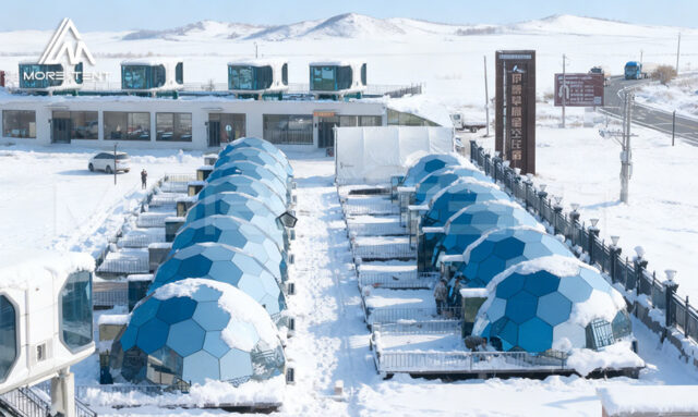 Insulated glass dome room for warm winter camping and stargazing