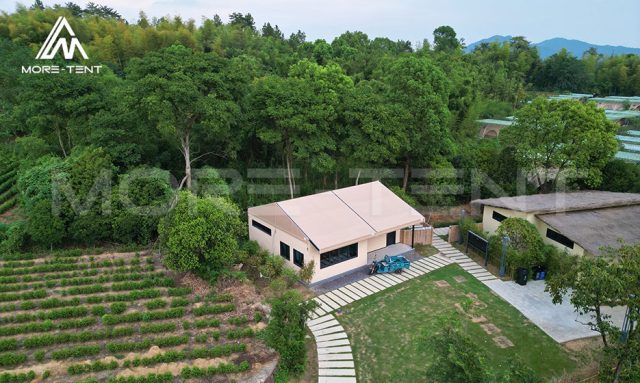 Luxury glamping tent for a farm stay with gardens and forest surroundings