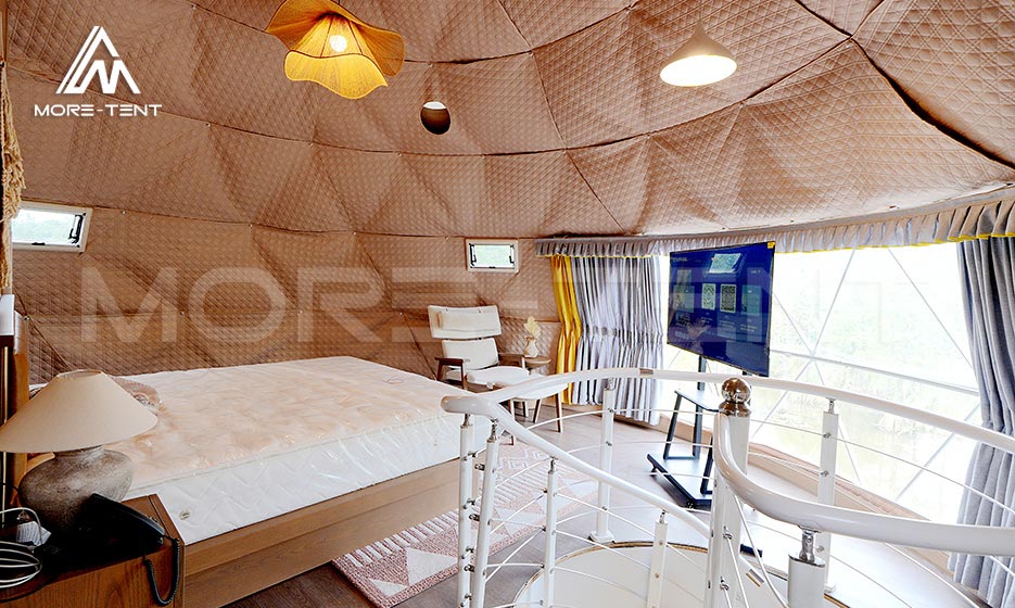 Dome glamping tent loft bedroom with insulated lining and large windows