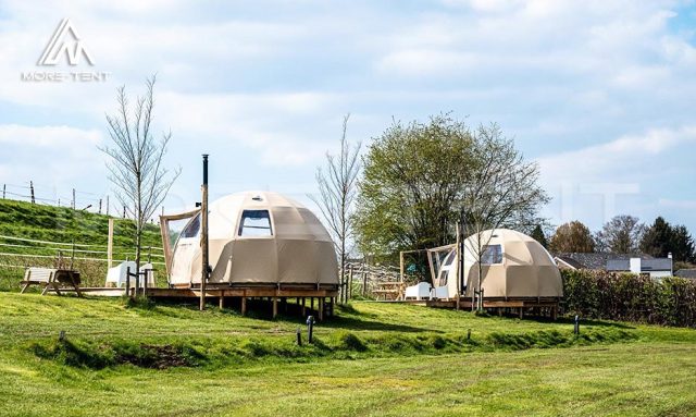 Panorama dome tents on raised decks in a rural resort