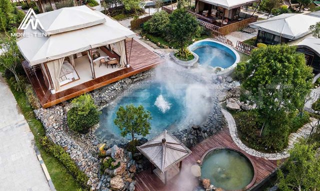 Aerial view of a Pattaya tent beside landscaped hot spring pools