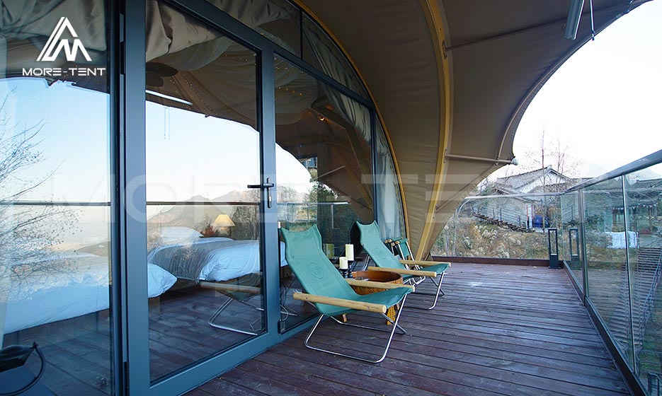 Private deck outside a glamping tent guest room